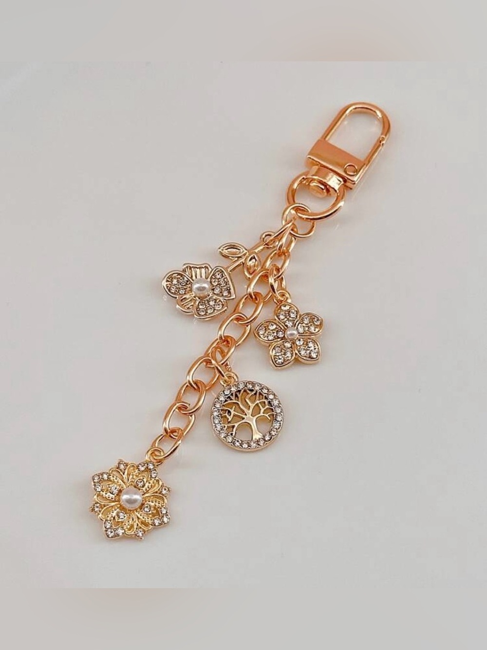 NWT HAILIAN Gold-Toned Metal Multi-Tiered LUX Bag Charm | Keychain